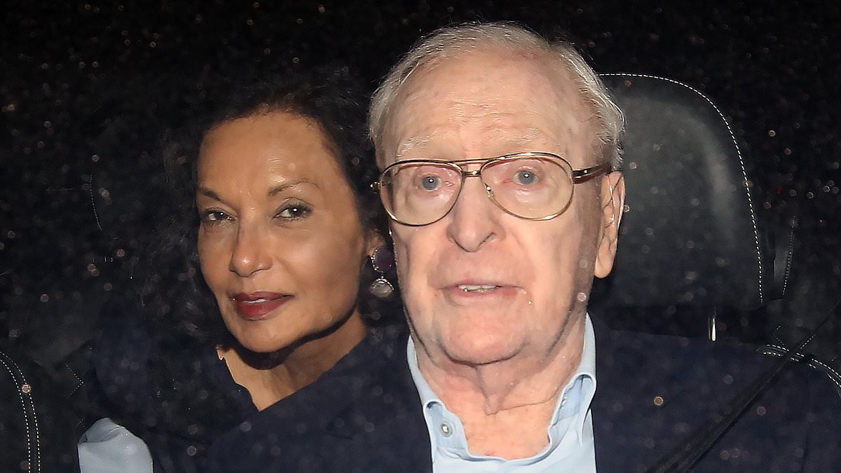 Sir Michael Caine, 91, pushes a walker as he's joined by wife Shakira, 77, for a night out at The Ivy
